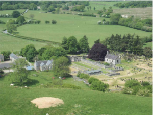 Looking down at the ruins of Strata Florida Abbey, from the hillside to the southeast. Dyfed Archaeological Trust.